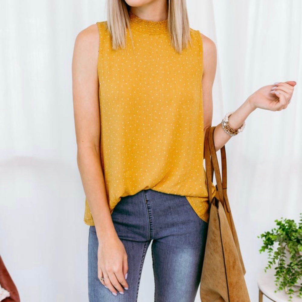 Mustard yellow and white sleeveless ruffle neck top